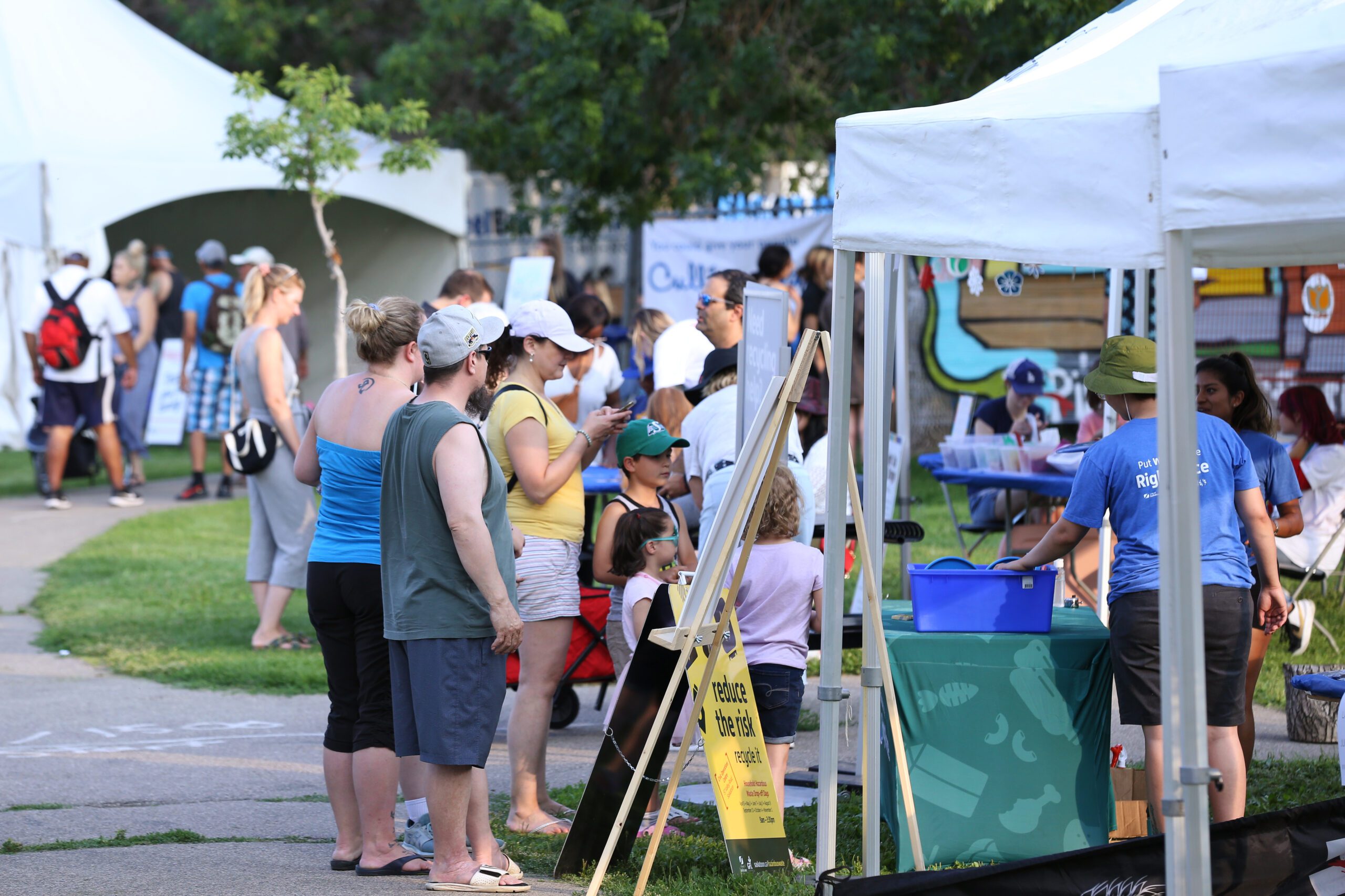 Fringe Festival, organization vendor with people, photo credit Nicole Stevenson Fringe Festival, organization vendor with people, photo credit Nicole Stevenson